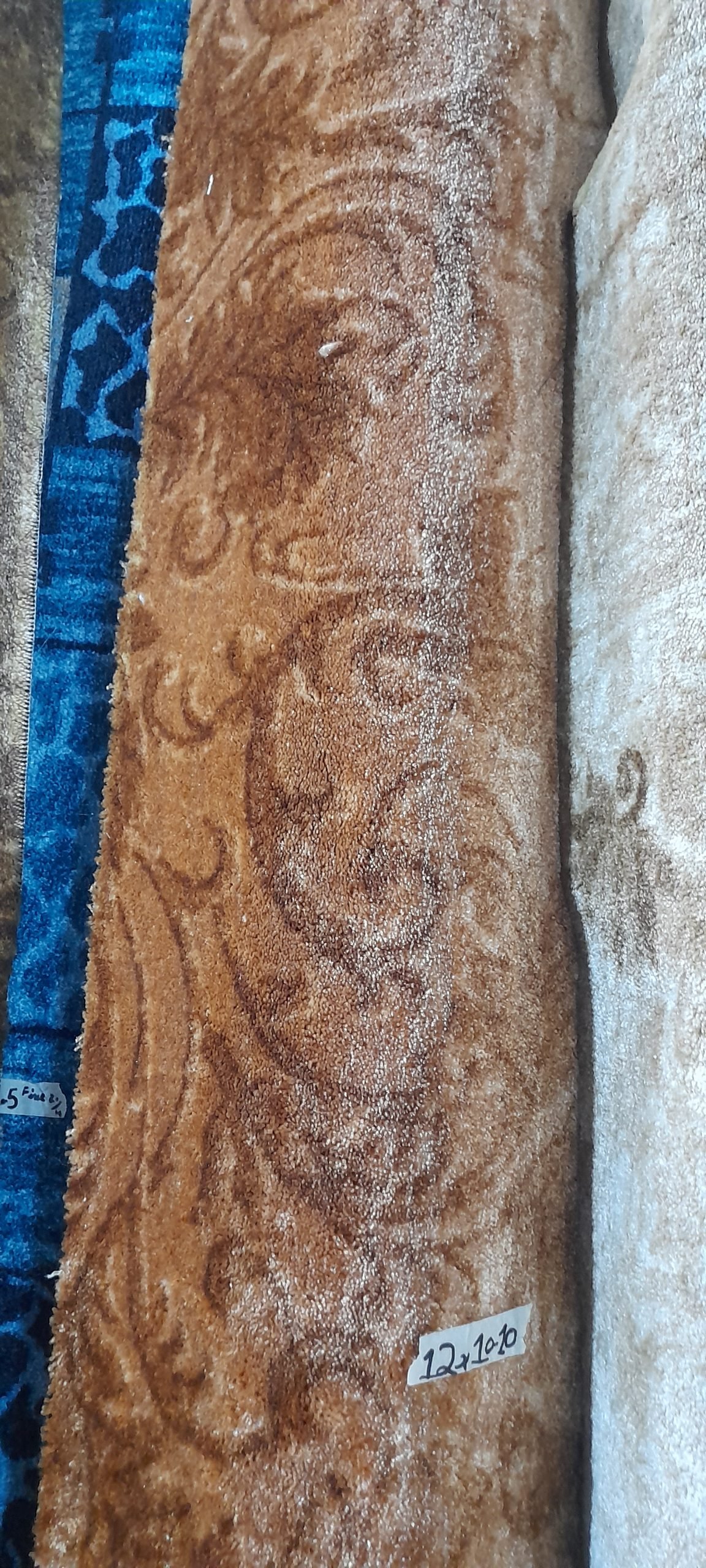 Awais Carpets have large variety of carpets and vinyl tiles